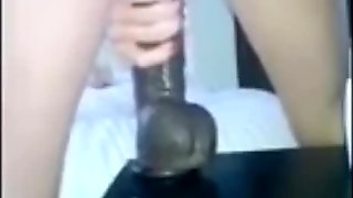 Squirting on huge dildo